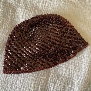Rare 70s vintage Halston sequin knit skull cap with metallic lurex fibers.